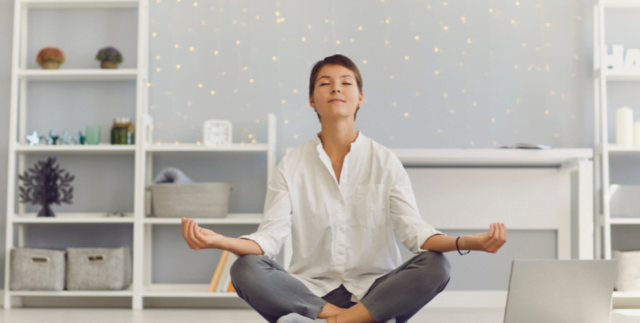 An individual in peaceful meditation, symbolizing the calm and balance potentially achievable through using Zephyr Health's nano CBD for stress relief.