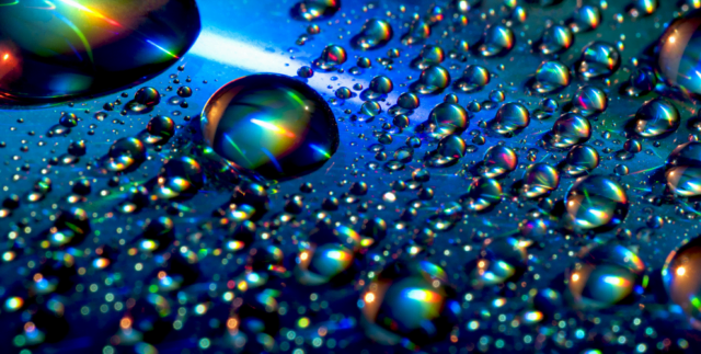 Close-up of vibrant droplets symbolizing nano-emulsified CBD.